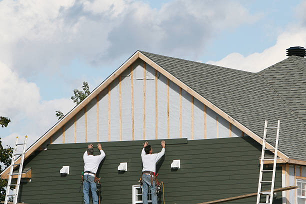 Professional Vinyl Siding technician working in Woodstock, GA